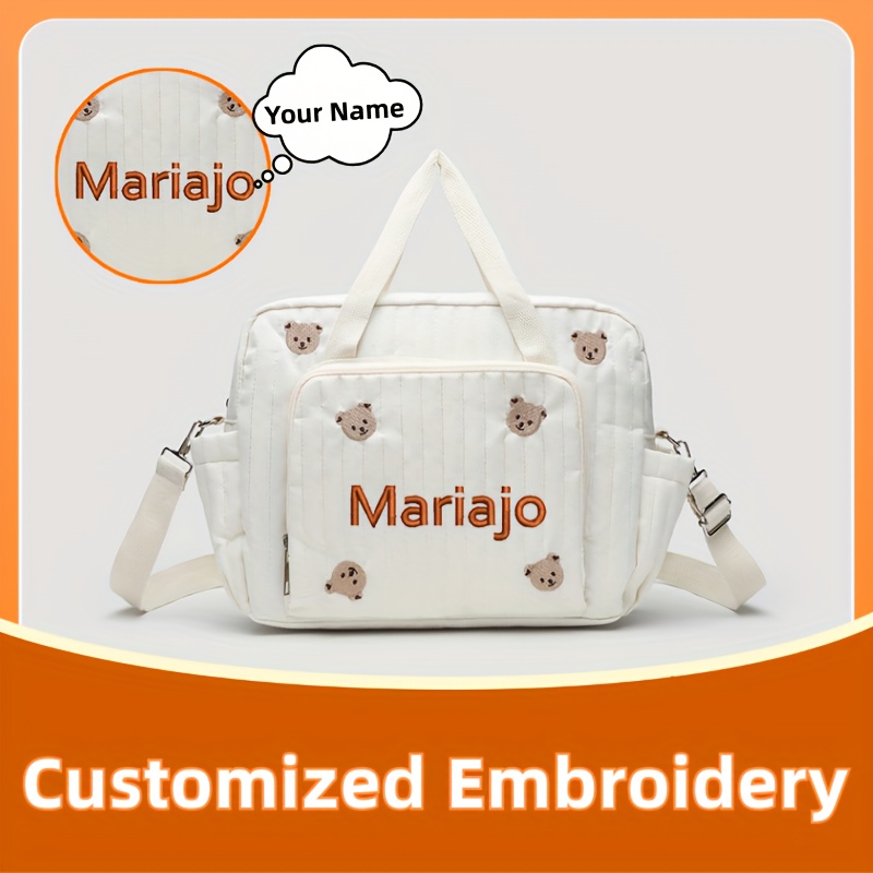 Embroidery Font Free - กระเป๋าเดินทางลายหมีและดอกทิวลิป 1 ใบ พร้อมบริการปักชื่อตามสั่ง (สำหรับการสั่งทำพิเศษ กรุณาระบุแบบตัวอักษรและข้อความ)